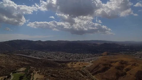 CLOUDS AND FREEWAY TIMLAPSE 4K Stock Footage 98469576