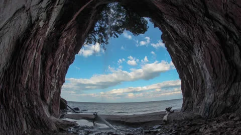 Clouds and lake from in cave Stock Footage 23844340