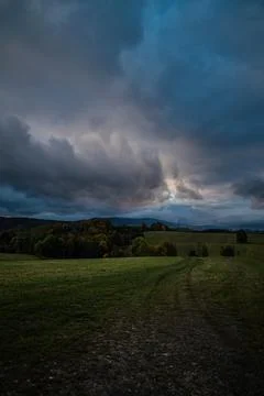 Clouds and meadow Stock Photos