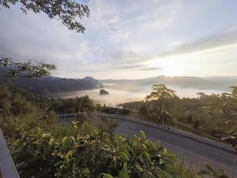 Clouds and mist covered at the top of the mountain. Stock Photos