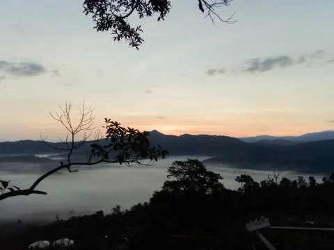 Clouds and mist covered at the top of the mountain. Stock Photos