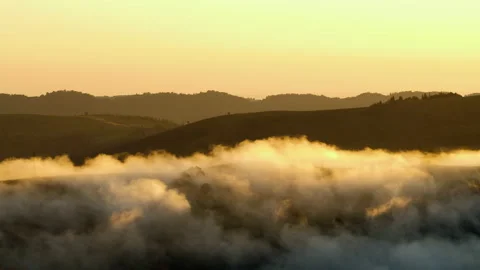 Clouds and Mist in Mountain, High peaks with Forest, Wonderful morning sunrise Stock Footage 139881318