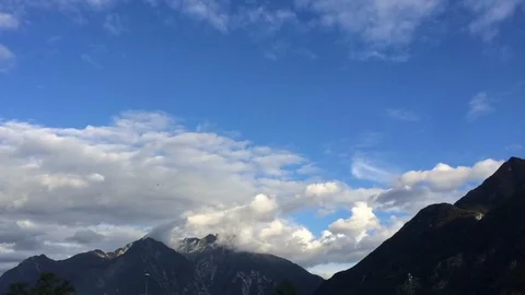 Clouds and montains Time Lapse Stock Footage 99496253