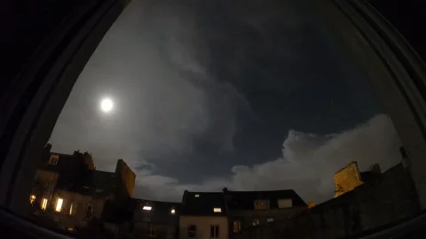 The clouds and the moon at night over the northern houses Stock Footage 272159452