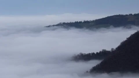 Clouds and mountains from above time lapse Stock Footage 265318070