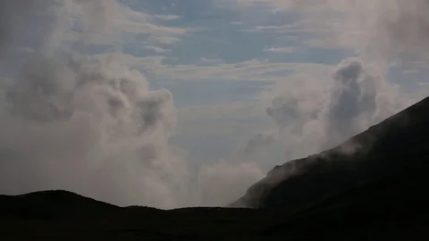 Clouds and mountains silhouette Stockbeeldmateriaal 85391759