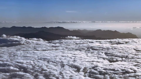 CLOUDS AND MOUNTAINS IN THE SKY 2 - 4K Stock Footage 127101693