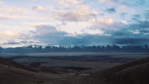 Clouds and mountains, time lapse. Mountain altai, around Mongolia. 動画素材 77141397