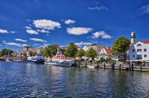 Clouds and the old lighthouse in Warnemünde, Rostock, Germany. Foto stock