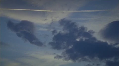 Clouds and Plane Trace Video stock 1013243