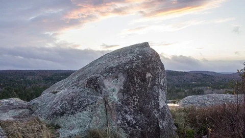 Clouds and pointy rock Stock Footage 100138738