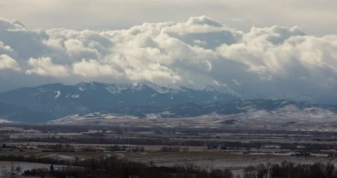 Clouds and rain time lapse over mountains Stock Footage 165242088