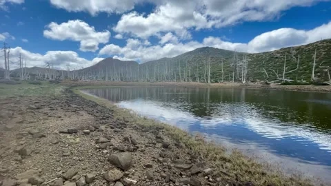 Clouds and Reflection at Chetco Lake, Kalmiopsis Wilderness, Southern Oregon Video stock 163626353