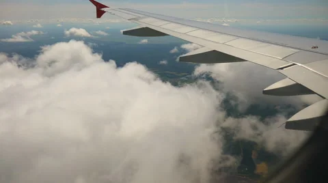Clouds and the river under a plane wing Stockbeeldmateriaal 54896640