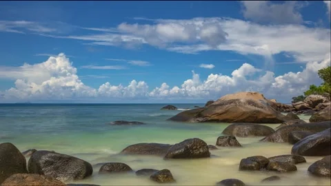 Clouds and rocky beach on a tropical island Stock Footage 155232515
