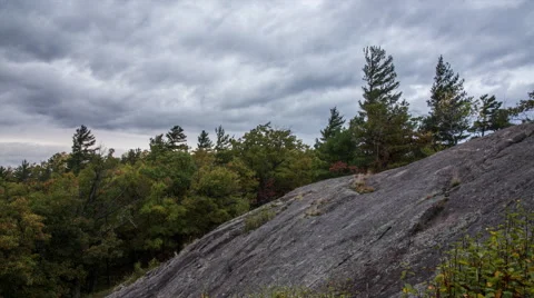 Clouds and rocky outcrop Stock-Footage 43880014