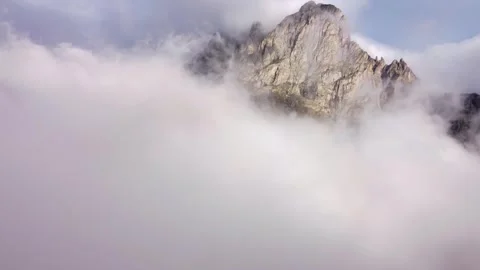 Clouds and rocky peak Stock Footage 242033901