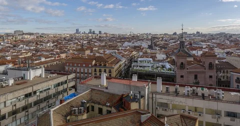 Clouds and rooftops of Madrid from Plaza del Callao, Madrid, Spain, Europe Stock-Footage 97495504