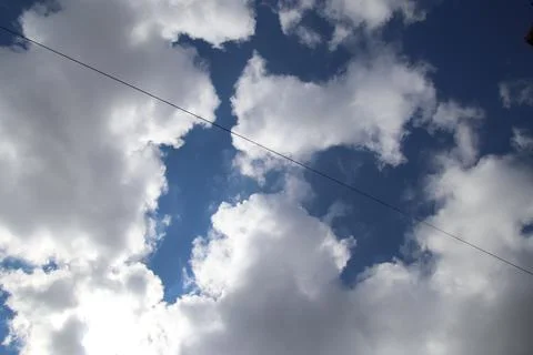 Clouds and a rope Stock Photos