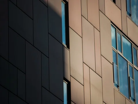 Clouds and Shadows on Building Exterior Time-Lapse Stock Footage 77559701