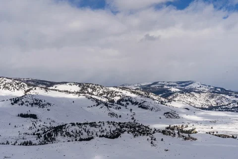 Clouds and shadows moving over Yellowstone Stock Footage 129981129