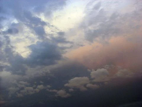 Clouds and sky in the evening after rain, before sunset. Stock Photos