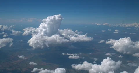 Clouds and sky from inside airplane Stock Footage 155820376