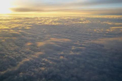 Clouds and sky seen from plane Stock Photos