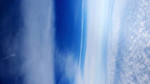 Clouds and sky as seen through window of an aircraft. Stock Footage 166027951