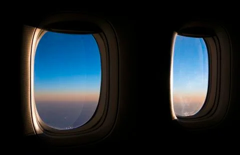 Clouds and sky as seen through window of an aircraft Foto stock