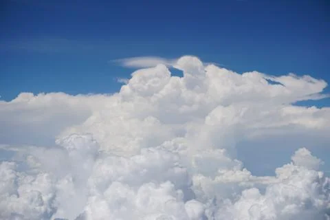 Clouds and sky as seen through window of an aircraft Foto stock