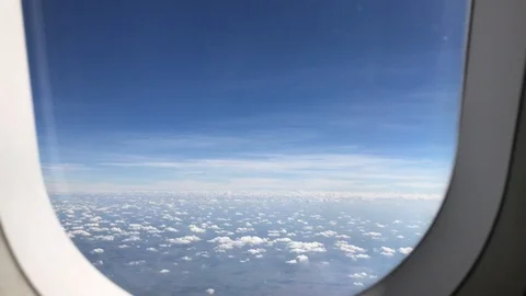 Clouds and sky view on airplane form window Stock Footage 89134355