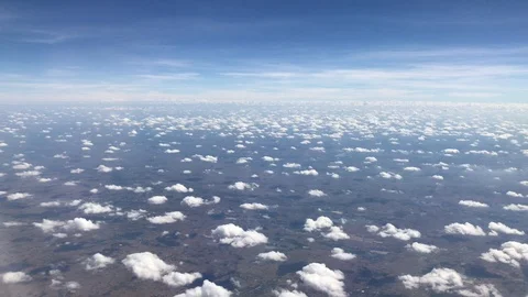 Clouds and sky wide view on airplane form window Stock Footage 89134817