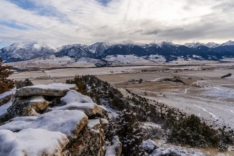 Clouds and slider over mountain valley Stock Footage 128672928