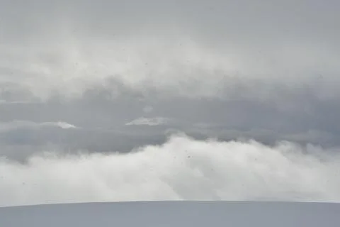 Clouds and snow background texture norway scandinavia Stock Photos