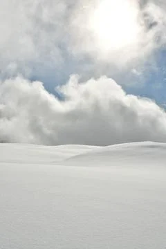Clouds and snow background texture norway scandinavia Fotos de archivo