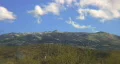 clouds and snow faced mountain in time lapse HD Footage