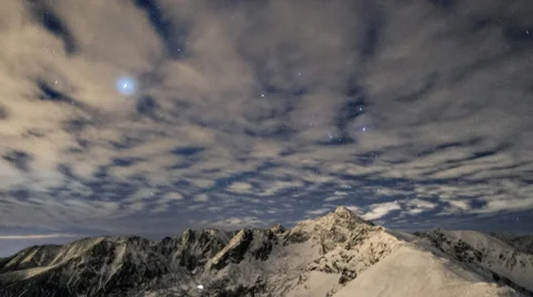 Clouds and stars over the mountains (2) Stock Footage