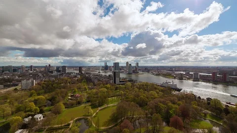 Clouds and Sun above modern Business City Stock Footage 98496361