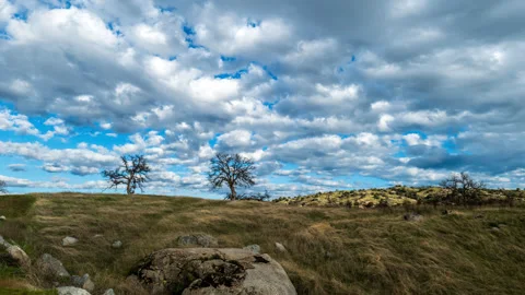 Clouds and Sun Dapple Oak Studded Lanscape Time Lapse Stock Footage 283073513