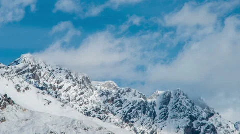 Clouds and sun on mountain ridge Video stock 61321658