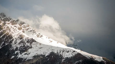 Clouds and sun on mountain ridge Video stock 62774806