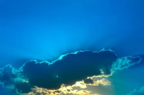 Clouds and sun rays background. Stock Photos