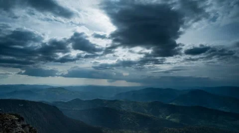 Clouds and sun rays dancing over the valleys Stock Footage 53219550
