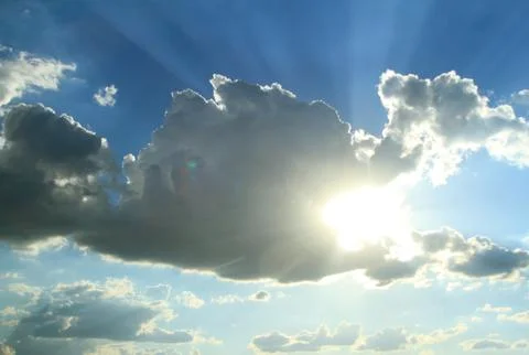 Clouds and Sun Rays Stock-Fotos