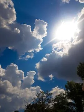Clouds and Sun in the Summer Stock Photos