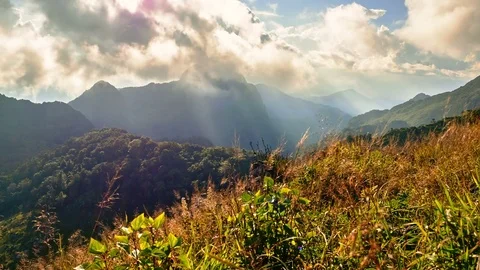 Clouds and sunbeam over Chiang Dao big mountain. Stock Footage 77624220