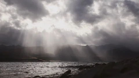 Clouds and sunbeams shining over the lake Stock Footage 80355062