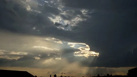 Clouds and sunbeams sunlight in the dusk sky Stock Footage 137456819