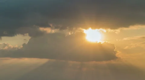 Clouds and sunrise breaking through cloud mass Stock Footage 62232821